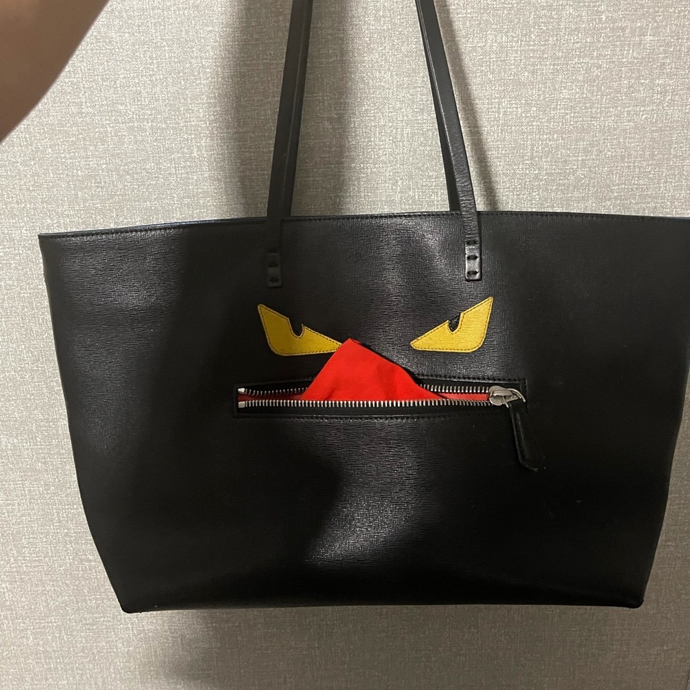 Monster limited edition fendi authentic purse .